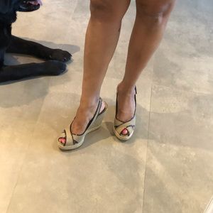 Prada Wedge (shows ware on inside of shoe) See pic